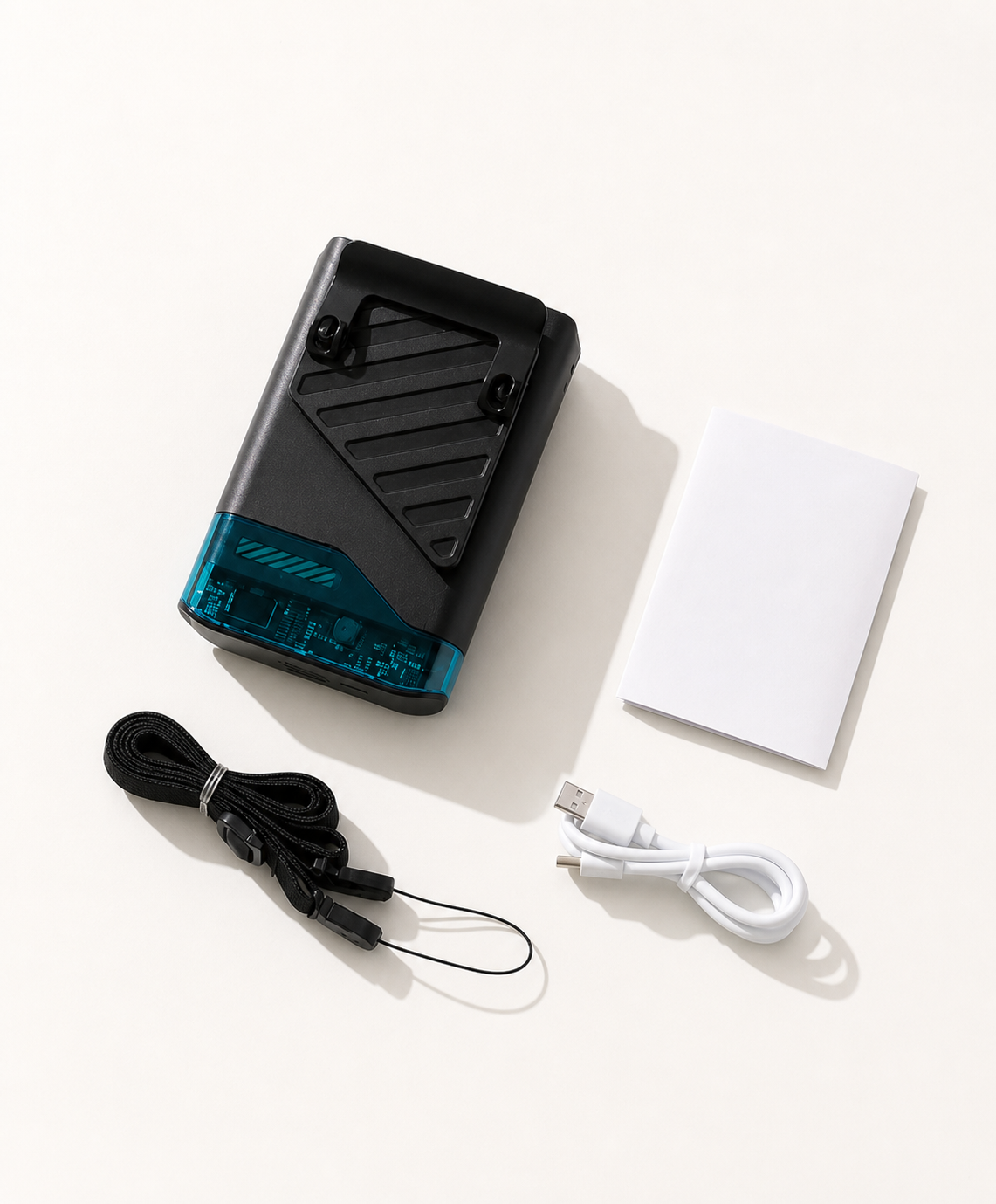 Lunrevo Fold Air black portable fan with lanyard, USB-C charging cable, and quick-start leaflet